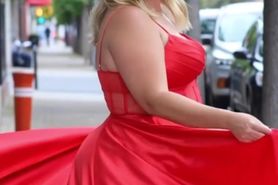 Red dress on the sidewalk