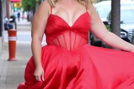 Red dress on the sidewalk