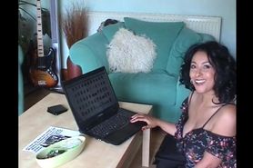 She looks at Wankers huge collection of Her pics