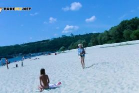 Beautiful blonde nudist sunbathe her trimmed pussy