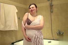 Plump mature in the shower