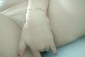 wife fingering herself in the bath