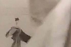 Thylida nude applying lotion