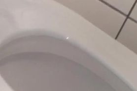 Two public pees from behind