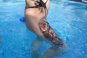 Anal slut bathing in the pool