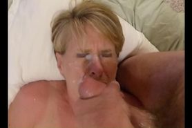 Cumslut Beth takes a blast of cum to the face and moth 