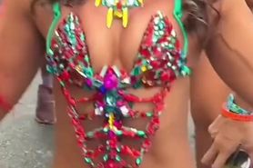 Hot Carnival Girl Dances for Happy On-Looker
