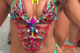 Hot Carnival Girl Dances for Happy On-Looker