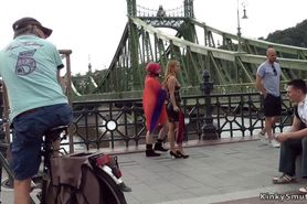 Mistress pisses redhead slut in public