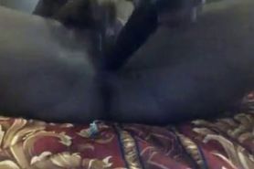 Horny black babe loves fingering pussy