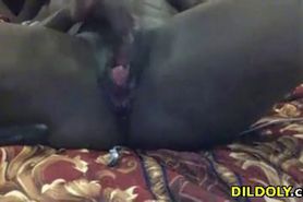 Horny black babe loves fingering pussy