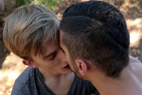 Strong twink gays enjoying outdoor sex on the bench