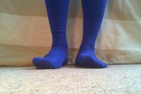 Playing in Blue Knee-Length Socks