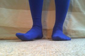 Playing in Blue Knee-Length Socks