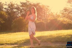 Petite MILF Lily Chey outdoor striptease and posing