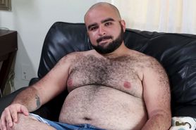 Fat gays with sexy fur on a leather sofa enjoying great