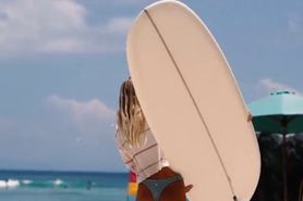 sexyAF surfer girl in a thong bikini