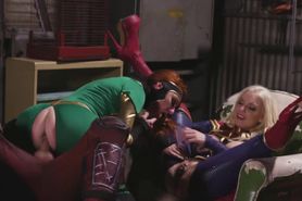 Busty pornstars in Captain Marvel parody sucking a cock