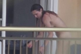 Nude on balcony