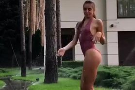Teen modeling a one-piece swimsuit