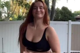 Sexy redhead outside