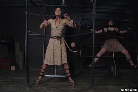 Two slaves in steel bondage vibrated