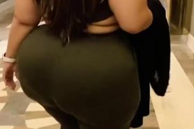 Huge ass in legging walking