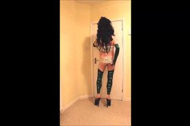 Brunette slut in black and green footless stockings