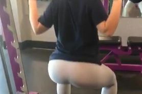 Katie doing squats at the gym