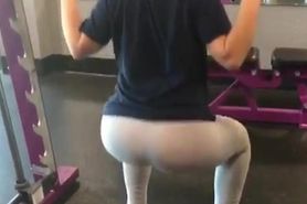 Katie doing squats at the gym