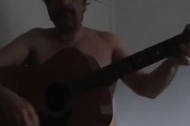 A man singuing a song nude