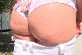 Nasty teens flashing giant asses outdoor and touching