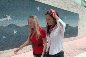 Two hot babes playing with each others butts