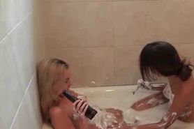 Slutty blonde eating massive cock in bathtub