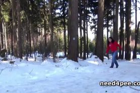 Teen brunette dares to take a piss in snow