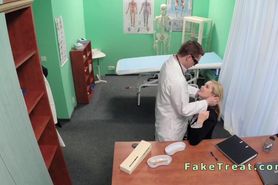 Doctor fucks sales woman on desk in fake hospital
