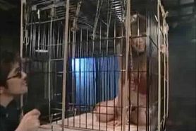 Caged And Sprayed Asian Teen