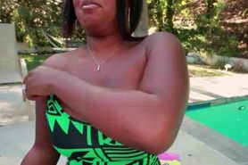Chesty big ass ebony posing by the pool