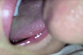 Ejaculating his cum on her tongue