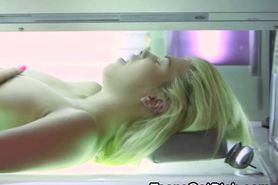 Blonde Teen Playing With Herself In A Tanning Bed
