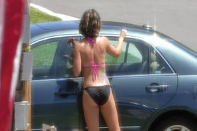 Candid Brunette Washing Car