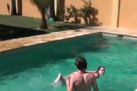 Horny college girls stripping naked in the pool