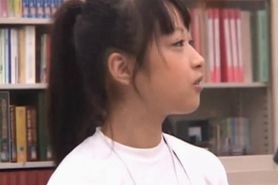 Cute asian teen girl teased in the school library