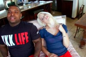 Slutty MILF mouth fucking her black neighbors big cock