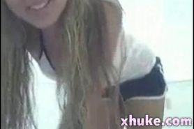 Young blonde strips on webcam 
