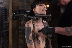 Tattooed petite slave on device bondage