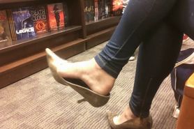 Candid Girl in the library extremely Dangling her heels