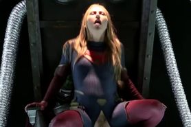 The blonde SuperGirl and a green monster drilling her h