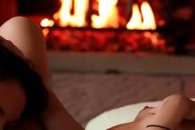 Superb lesbian duo enjoying oral sex by the fire place