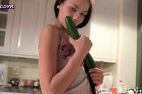 Babe masturbating with cucumber